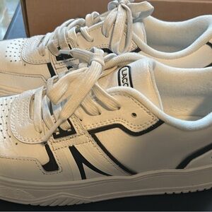 Lacoste White Sneakers with Black Detailing